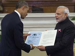 Modi_gifts_Telegram_Obama_240_afp.jpg