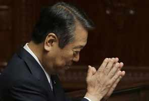 Revolt in Japan ruling party, government keeps majority