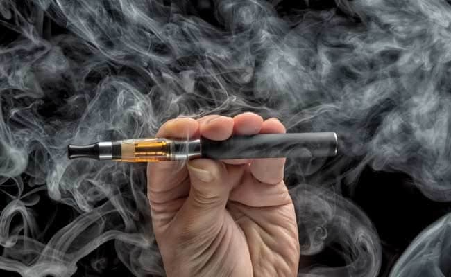 E-cigarettes are battery-powered devices that heat up a liquid containing nicotine and artificial flavouring. The vapour is inhaled -- "vaped" -- and exhaled, much like a cigarette. (Representational Image)