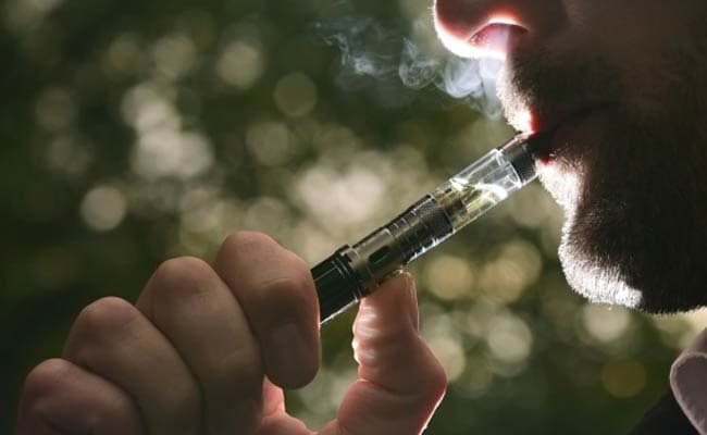 Electronic cigarettes are battery-powered devices that heat a nicotine-containing liquid, which is inhaled much like a cigarette. (Representational Image)